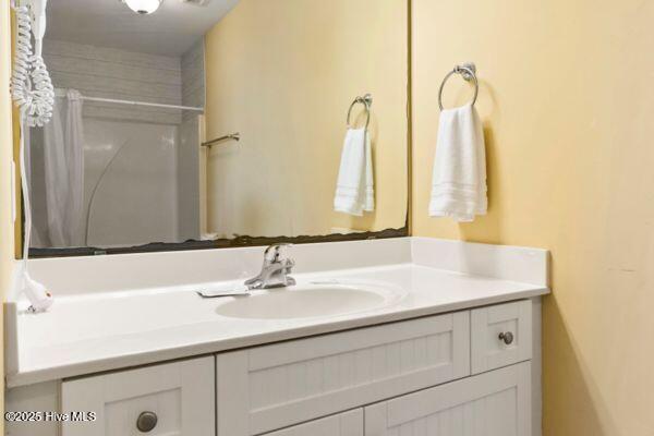 1505 N New River Dr Unit 210, Surf City, NC 28445 - full bath featuring vanity and a shower with shower curtain