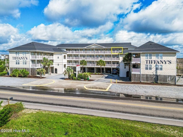 1505 N New River Dr Unit 210, Surf City, NC 28445 - view of property featuring uncovered parking