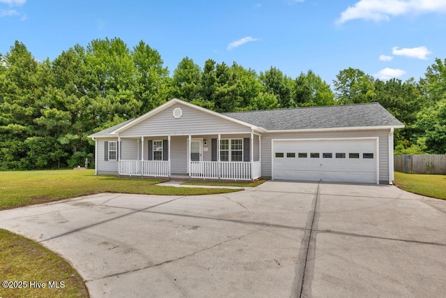 723 Queens Creek Rd, Hubert, NC 28539 - single story home with covered porch, driveway, and an attached garage
