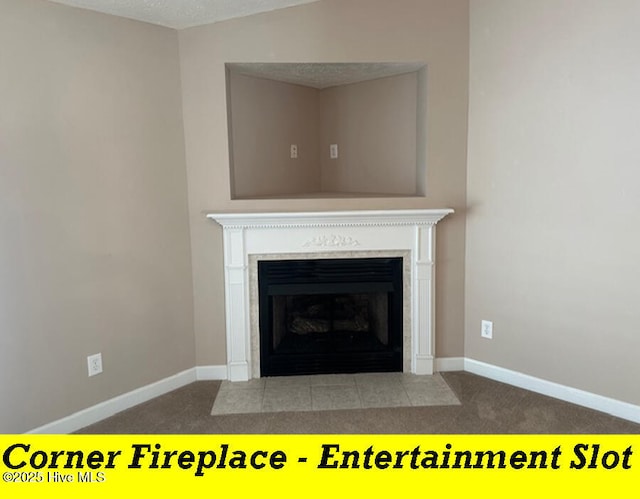 12 Deerwood Ln, Pinehurst, NC 28374 - detailed view of a fireplace with flush hearth, baseboards, carpet, and a textured ceiling