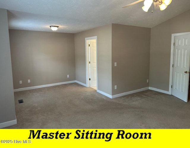 12 Deerwood Ln, Pinehurst, NC 28374 - carpeted spare room with ceiling fan, baseboards, and a textured ceiling