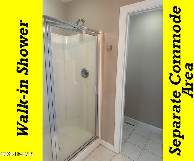 12 Deerwood Ln, Pinehurst, NC 28374 - full bathroom with tile patterned flooring, a shower stall, and baseboards