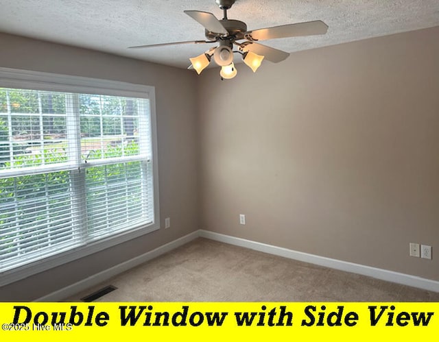 12 Deerwood Ln, Pinehurst, NC 28374 - unfurnished room featuring a textured ceiling, light carpet, baseboards, and ceiling fan