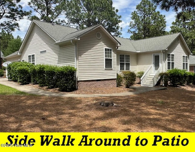 12 Deerwood Ln, Pinehurst, NC 28374 - view of side of home featuring crawl space