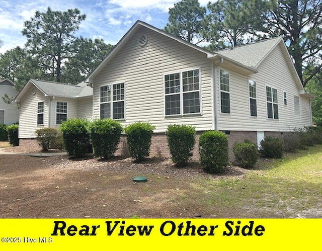 12 Deerwood Ln, Pinehurst, NC 28374 - view of side of home with crawl space