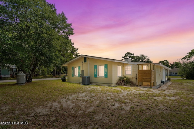 115 NE 66th St, Oak Island, NC 28465 - view of front of property featuring central AC unit