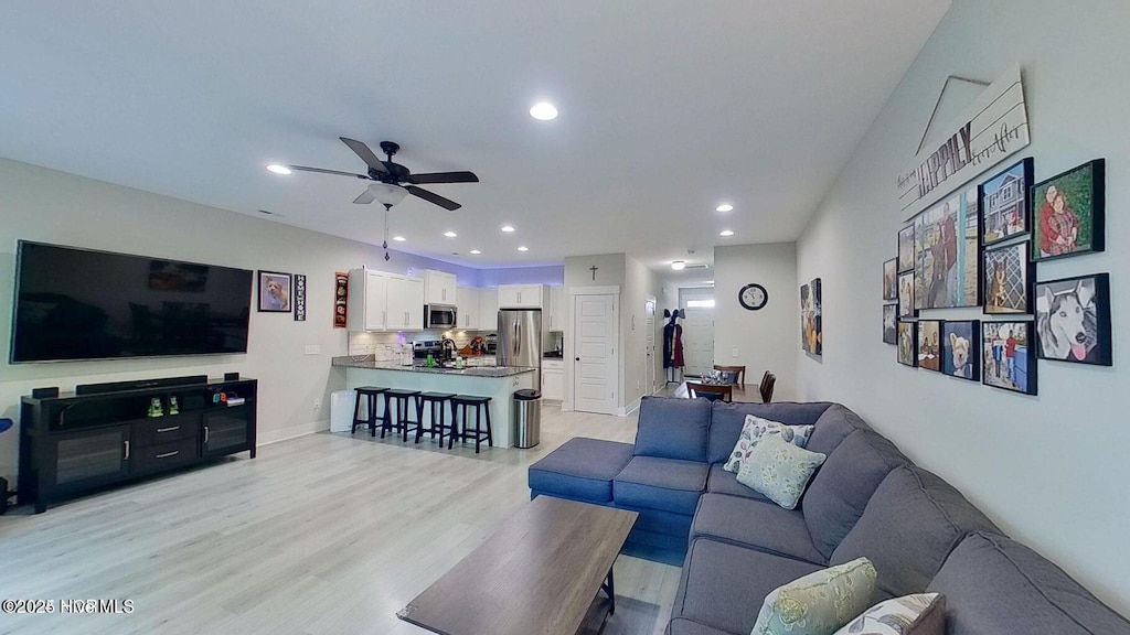 11 Acacia Rd, Hampstead, NC 28443 - living area featuring ceiling fan, light wood-type flooring, and recessed lighting