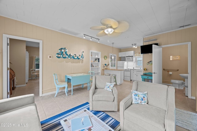 215C Battleground Ave, New Bern, NC 28560 - living room featuring light tile patterned flooring and a ceiling fan