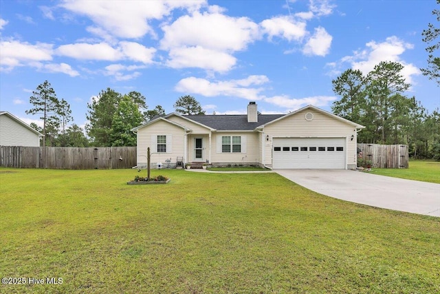 136 Van Riggs Rd, Hubert, NC 28539 - single story home with a garage, driveway, and a chimney