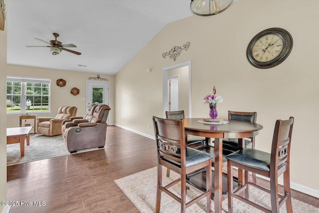 136 Van Riggs Rd, Hubert, NC 28539 - dining room with lofted ceiling, wood finished floors, and a ceiling fan