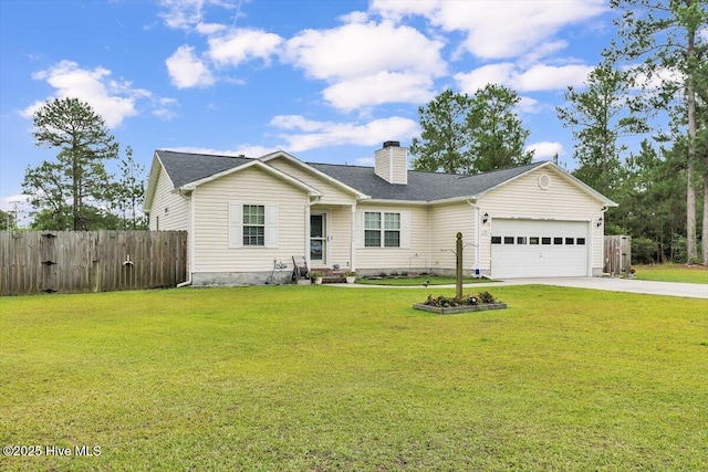 136 Van Riggs Rd, Hubert, NC 28539 - ranch-style house featuring a garage, driveway, and a chimney