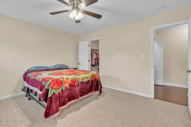 136 Van Riggs Rd, Hubert, NC 28539 - bedroom featuring carpet flooring, ceiling fan, and a spacious closet