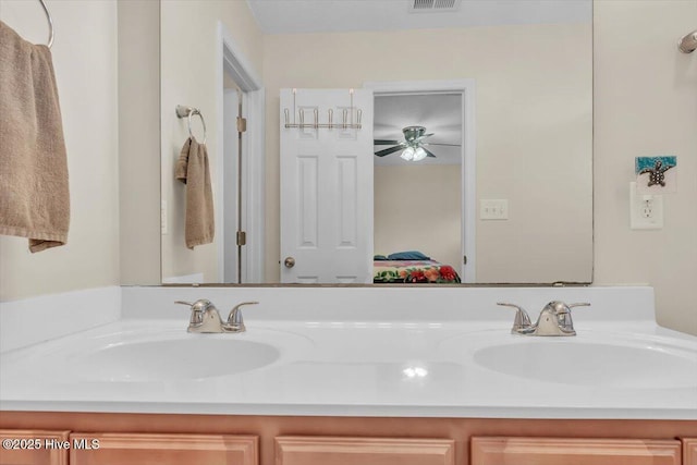 136 Van Riggs Rd, Hubert, NC 28539 - bathroom featuring double vanity and a ceiling fan