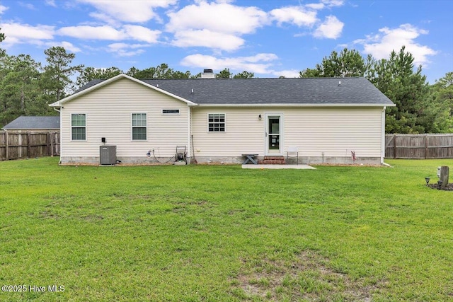 136 Van Riggs Rd, Hubert, NC 28539 - back of property with a fenced backyard, a chimney, and entry steps