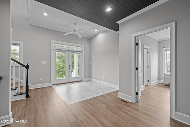 520 Cannonsgate Dr, Newport, NC 28570 - foyer with crown molding, stairs, wood finished floors, plenty of natural light, and recessed lighting