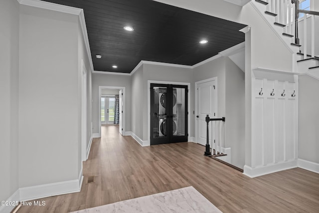 520 Cannonsgate Dr, Newport, NC 28570 - hallway with light wood-style floors, ornamental molding, french doors, stairs, and recessed lighting