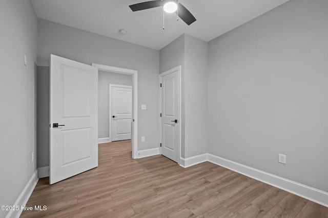 520 Cannonsgate Dr, Newport, NC 28570 - unfurnished bedroom with light wood finished floors and a ceiling fan