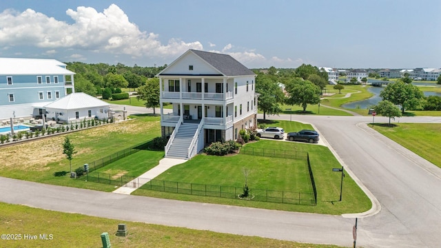 520 Cannonsgate Dr, Newport, NC 28570 - raised beach house with a balcony, a water view, and stairs