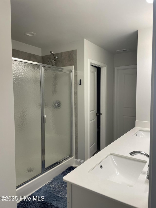 87 Sun Meadow Cir, Benson, NC 27504 - bathroom with a stall shower and double vanity