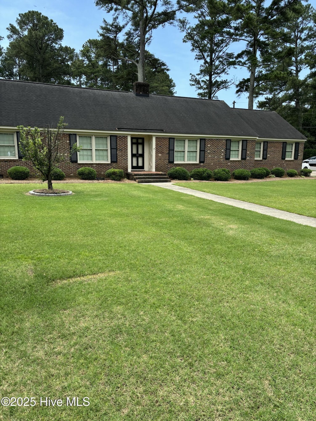 211 Forest Hills Rd NW, Wilson, NC 27896 - ranch-style home with a front lawn and brick siding