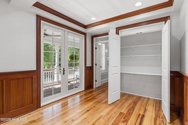 733 Legare Ln SW, Supply, NC 28462 - foyer entrance featuring french doors, light wood-style floors, wainscoting, ornamental molding, and recessed lighting