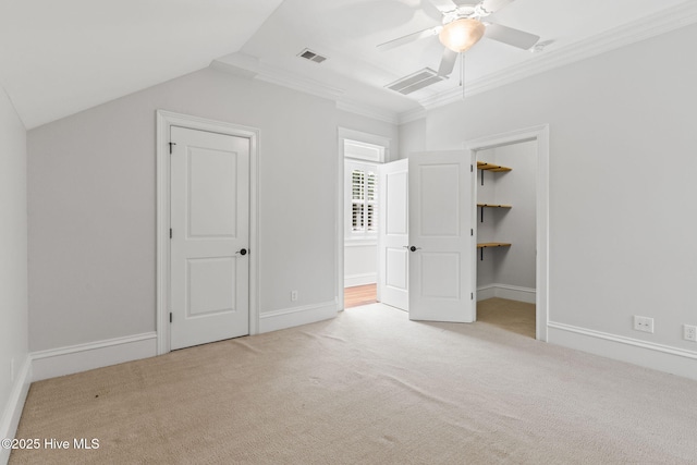 733 Legare Ln SW, Supply, NC 28462 - unfurnished bedroom featuring carpet floors, ornamental molding, a ceiling fan, lofted ceiling, and baseboards