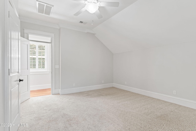 733 Legare Ln SW, Supply, NC 28462 - bonus room with carpet flooring, ceiling fan, baseboards, and lofted ceiling