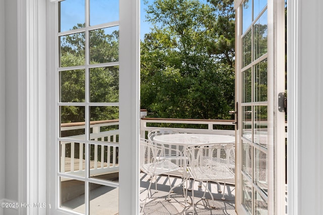 733 Legare Ln SW, Supply, NC 28462 - view of wooden balcony featuring outdoor dining space and a deck