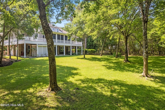 733 Legare Ln SW, Supply, NC 28462 - view of green lawn featuring a wooden deck