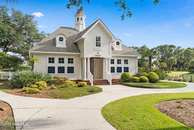 733 Legare Ln SW, Supply, NC 28462 - view of front of house with a front lawn