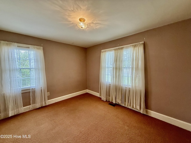 110 N Main St, Colerain, NC 27924 - carpeted empty room featuring baseboards