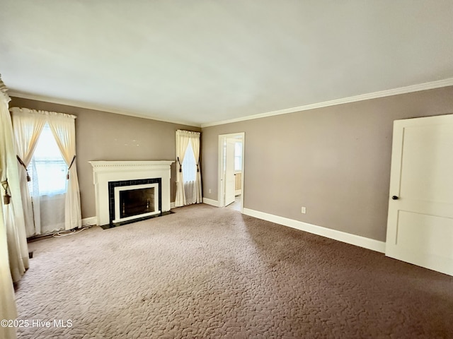 110 N Main St, Colerain, NC 27924 - unfurnished living room with healthy amount of natural light, ornamental molding, a fireplace with flush hearth, baseboards, and carpet floors