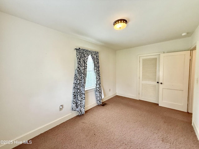 110 N Main St, Colerain, NC 27924 - carpeted spare room with baseboards and a smoke detector