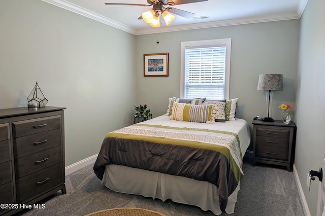 502 Vanderhorst Ave, Shallotte, NC 28470 - bedroom featuring dark carpet, crown molding, baseboards, and a ceiling fan