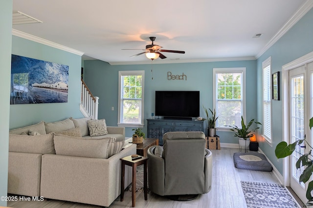 502 Vanderhorst Ave, Shallotte, NC 28470 - living room with ceiling fan, wood finished floors, ornamental molding, baseboards, and stairs