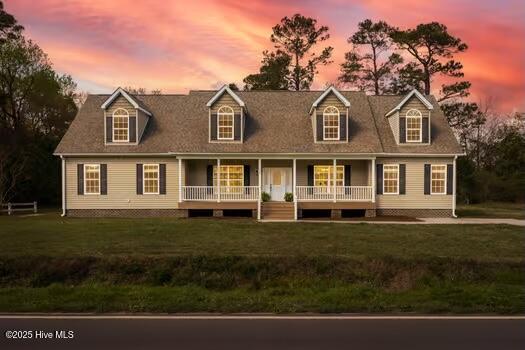 225 Factory Rd, Hampstead, NC 28443 - cape cod house with covered porch and a lawn