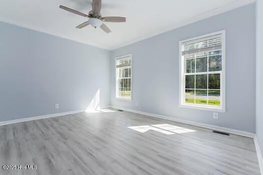 225 Factory Rd, Hampstead, NC 28443 - empty room with baseboards, ceiling fan, and wood finished floors
