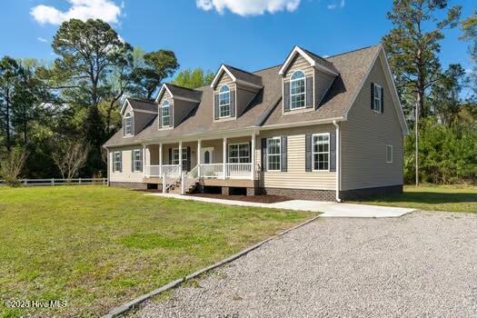 225 Factory Rd, Hampstead, NC 28443 - view of front facade featuring covered porch