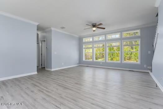 225 Factory Rd, Hampstead, NC 28443 - unfurnished room featuring ceiling fan, ornamental molding, wood finished floors, and baseboards