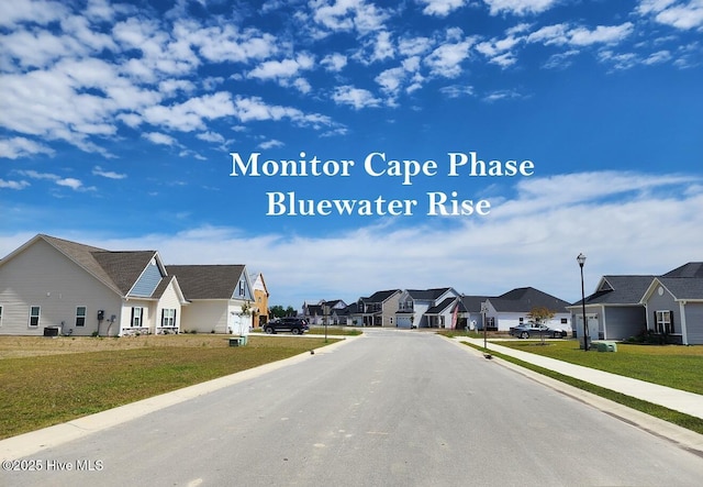 2008 Bluewater Blvd, New Bern, NC 28562 - view of asphalt street featuring a residential view, street lights, and curbs