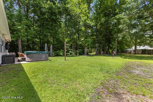 1135 Sunburst Way, Leland, NC 28451 - view of yard featuring a hot tub