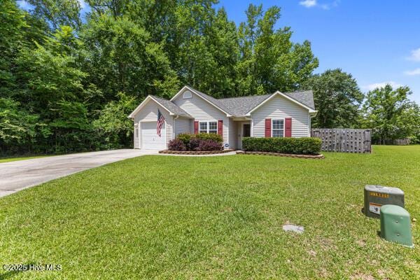 1135 Sunburst Way, Leland, NC 28451 - ranch-style house featuring concrete driveway, an attached garage, and a front yard