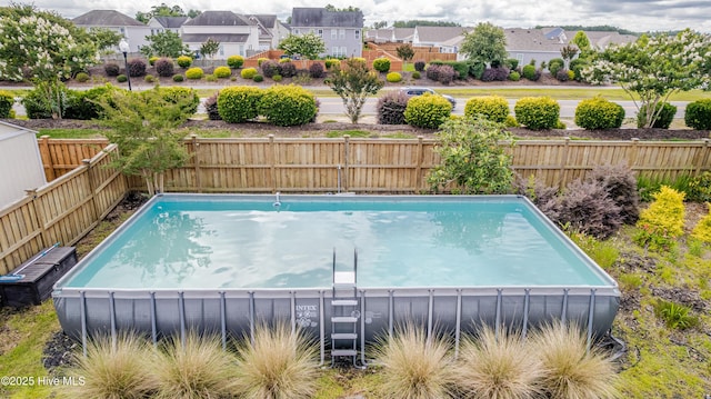 522 Heartwood Dr, Leland, NC 28479 - view of swimming pool with a fenced backyard and a residential view