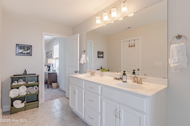 522 Heartwood Dr, Leland, NC 28479 - full bath featuring double vanity, tile patterned floors, and baseboards