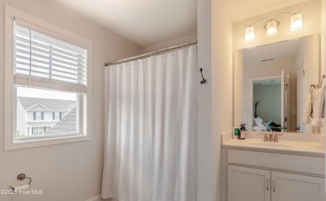 522 Heartwood Dr, Leland, NC 28479 - full bathroom with plenty of natural light, vanity, and curtained shower