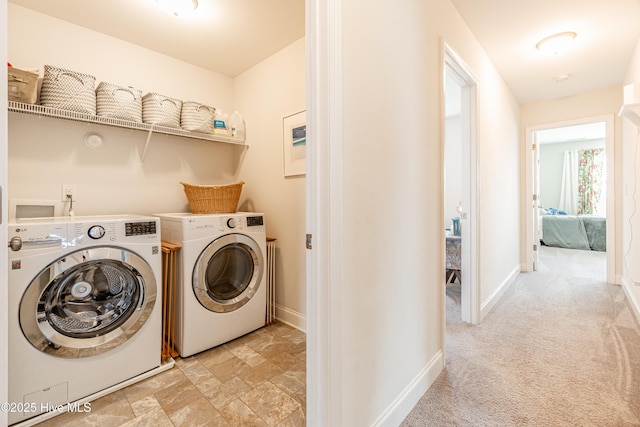 522 Heartwood Dr, Leland, NC 28479 - laundry room with independent washer and dryer, baseboards, and light stone finish floors