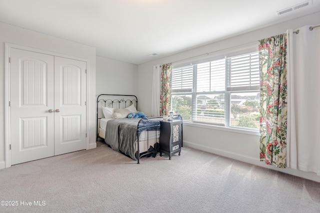 522 Heartwood Dr, Leland, NC 28479 - carpeted bedroom featuring baseboards and a closet