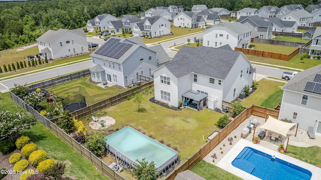 522 Heartwood Dr, Leland, NC 28479 - aerial view of residential area with a pool and a forest