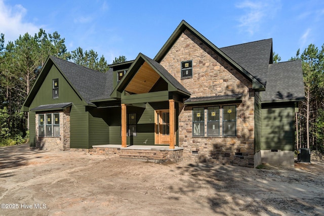 445 Oldham Rd, West End, NC 27376 - craftsman-style house featuring stone siding, a porch, roof with shingles, and crawl space
