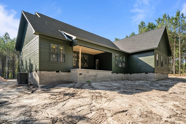 445 Oldham Rd, West End, NC 27376 - rear view of house featuring a shingled roof and crawl space